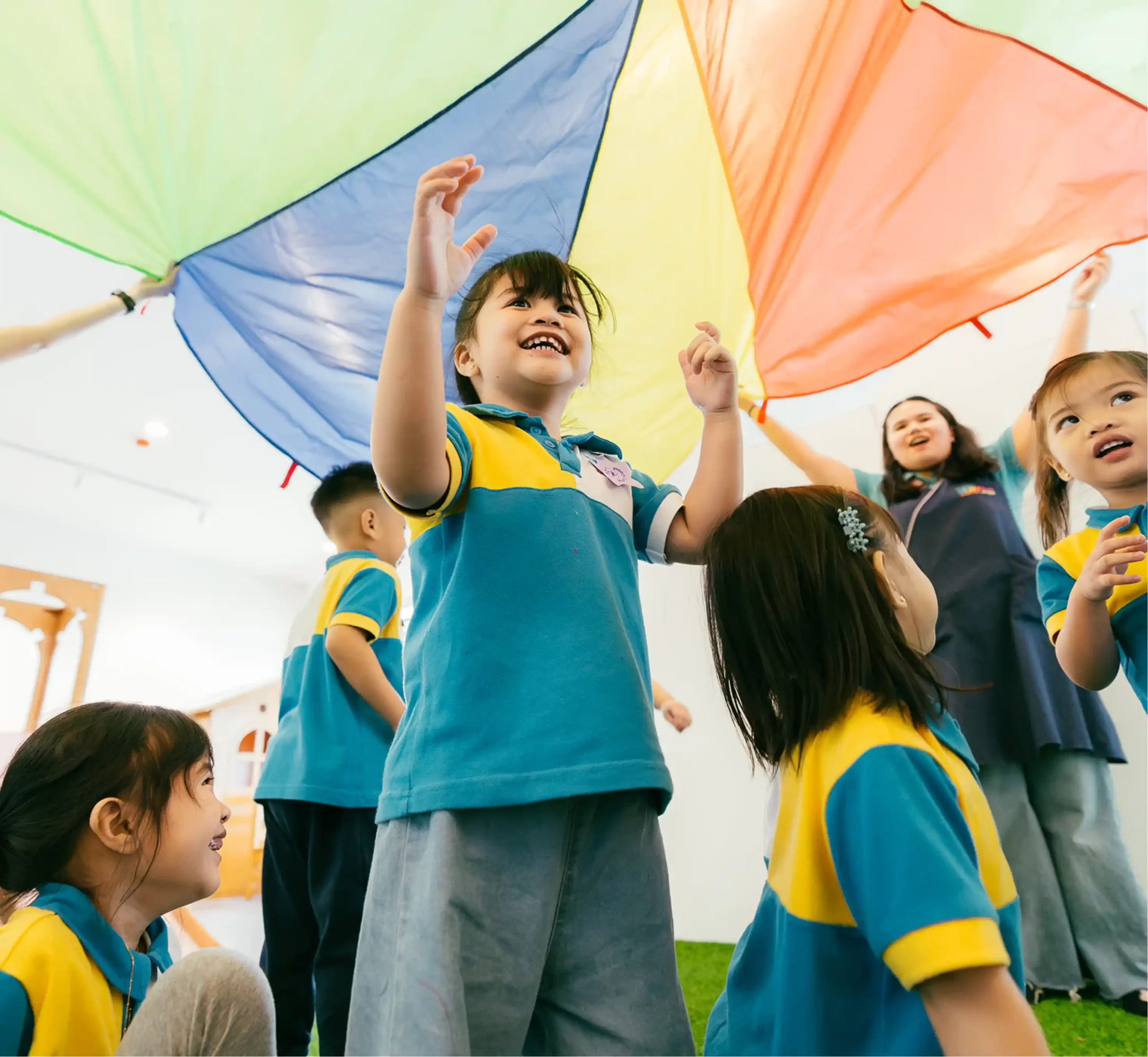 Happy Head Start students engaged in outdoor activities