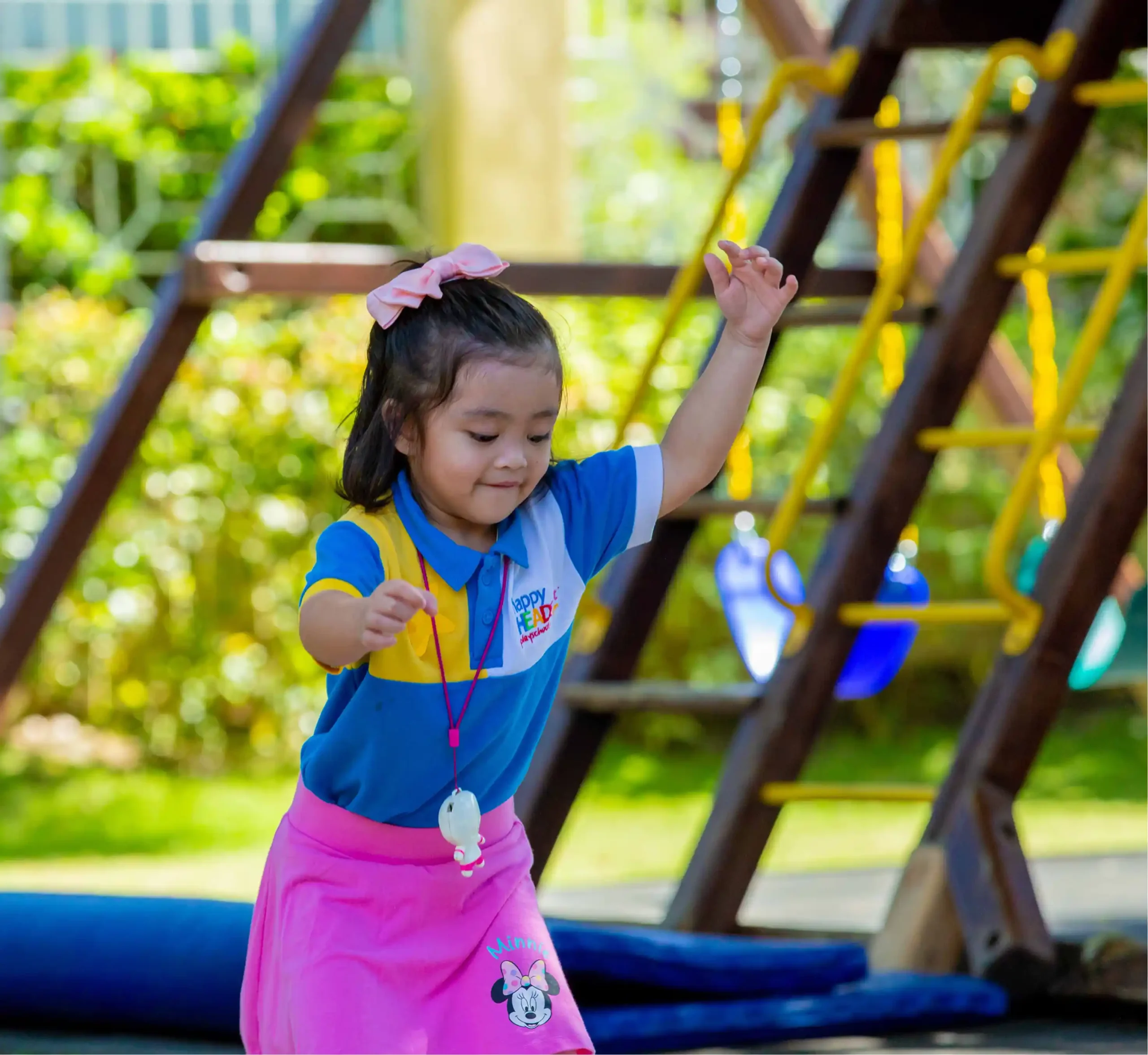 Happy Head Start student engaged in outdoor activities