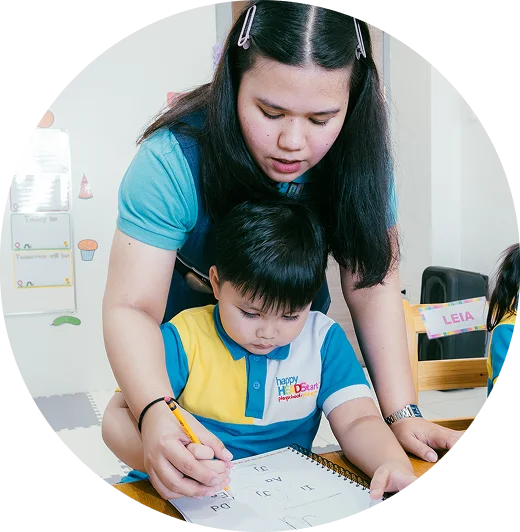 Happy Head Start student engaged in indoor activities
